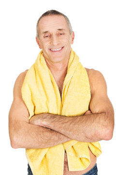 Mature man with a towel around neck