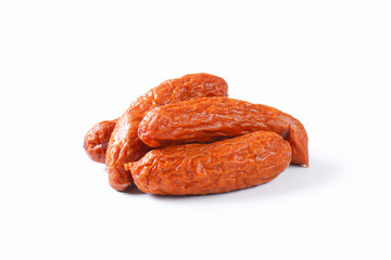 Kielbasa sausages on white background