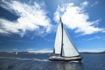 Fototapeta premium Sailboat participate in sailing regatta. Luxury Yachts.