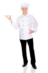 Chef holding white porcelain plate