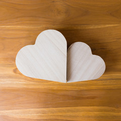 wood heart arrange shaped cloud on brown wooden background