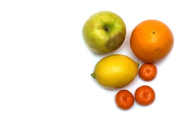 Apple, orange, lemon and tangerine. Photo.