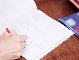teacher's hand writing in school diary