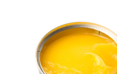 Indian ghee in a tin can over white background