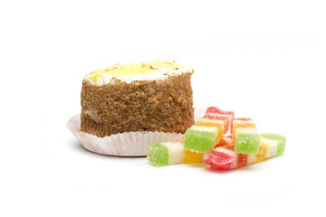 Cake and marmalade. Photo.