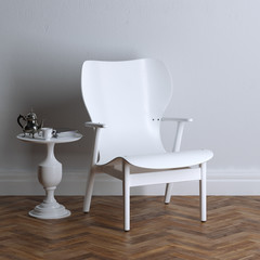 White wooden furniture - armchair and small coffee table