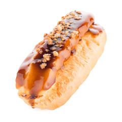 Eclair with caramel decoration