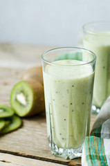 milkshake kiwi in a glass with straws