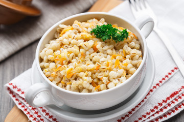 Barley porridge with carrot and onion