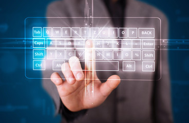 Businessman pressing virtual type of keyboard