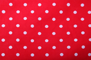 white and red polka dot background