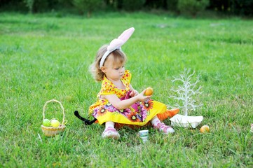 Naklejka na ściany i meble Adorable toddler girl wearing bunny ears