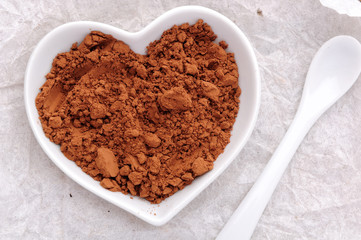 cocoa powder in shape of heart
