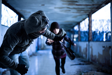 Snatcher Stealing a Bag from a Woman