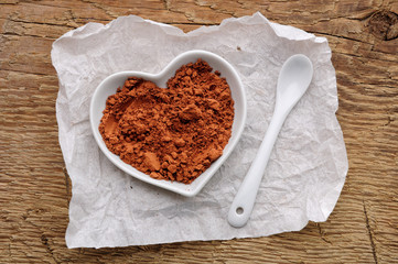 cocoa powder in shape of heart