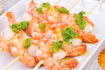 Ready to eat shrimps with green butter