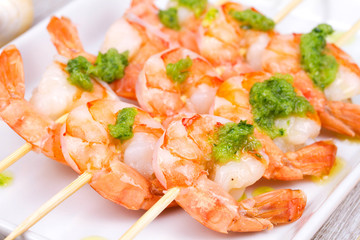Ready to eat shrimps with green butter
