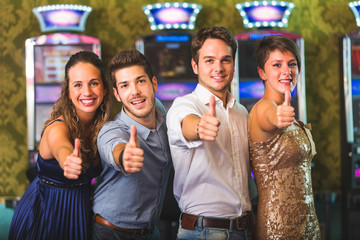 Naklejka premium Successful Friends at Casino