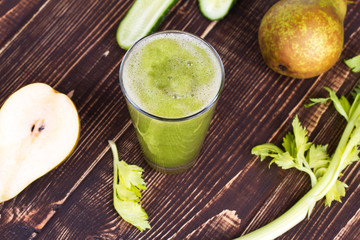 Cucumber, pear and celery juice. Slices of fruits and vegetables