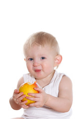 Child holding an apple