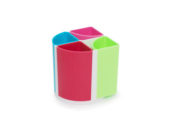 Fototapeta premium Colorful pencil holder isolated on white background