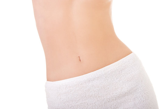 Close up on slim woman belly