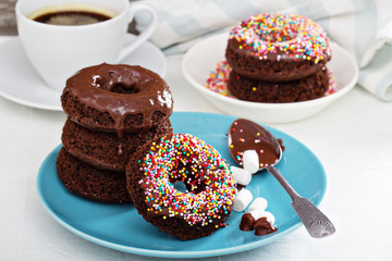 Stack of homemade baked chocolate donuts