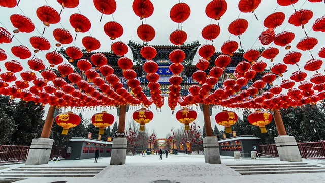 The decorated archway and the red lanterns  in Beijing, China