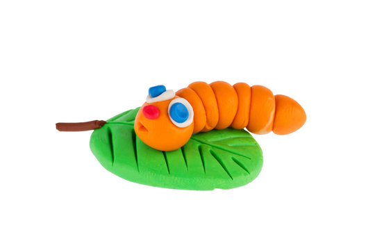 Worm from plasticine on white background