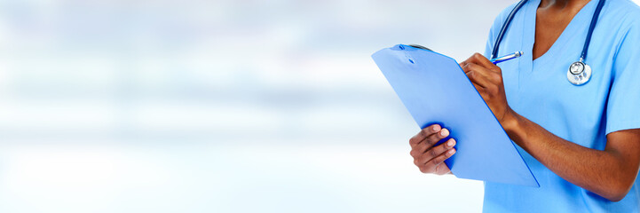 Hands of black doctor woman.