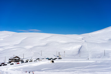 Fototapeta na wymiar Aerial View of skiers at Ski Resort Falakro, in Greece.