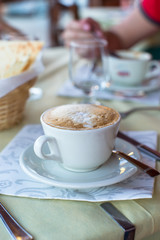 Delicious and tasty cappuccino for breakfast at cafe