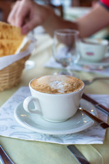 Delicious and tasty cappuccino for breakfast at cafe