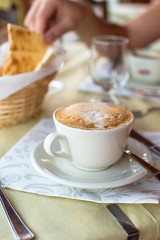 Delicious and tasty cappuccino for breakfast at cafe