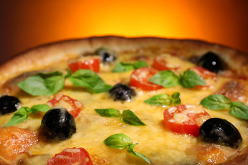 Italian pizza on dark colorful background