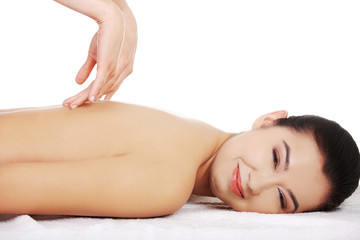 Obraz na płótnie Canvas Young woman massage in spa