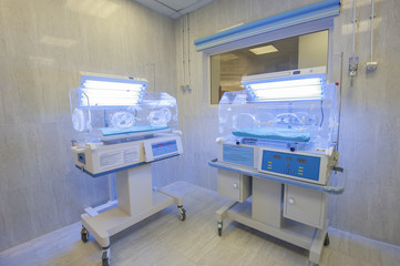 Infant incubator in a hospital ward
