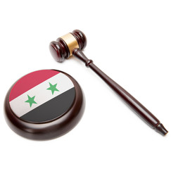 Judge gavel and soundboard with national flag on it - Syria