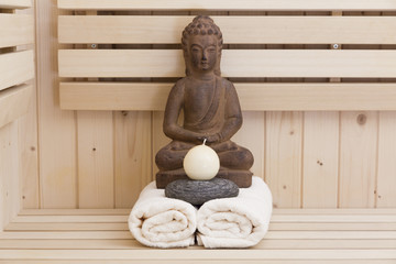 buddha statue and zen stones in sauna, relaxation background