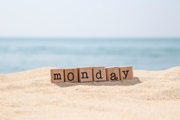 Monday word on sunny beach