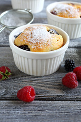 Cupcakes with blueberries and raspberries
