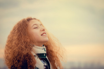 Happy,smiling little girl  enjoying nature