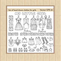 Vector set of hand drawn clothes for little girls