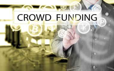 Businessman pushes virtual crowd funding button