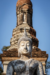 Fototapeta na wymiar Back of Old buddha statue in Sukhothai Historical Park
