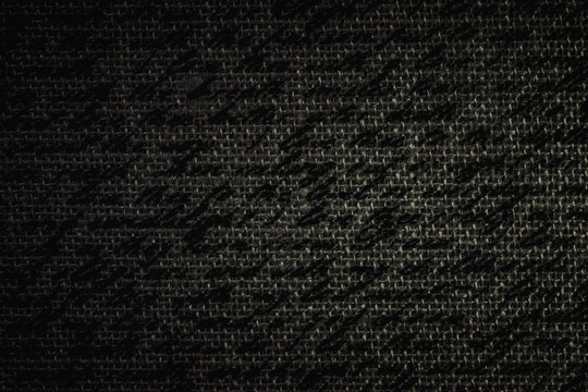 Blur text on black fabric burlap