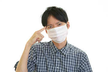 風邪に罹患した男性