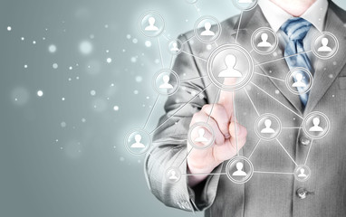 man hand pressing social media icon