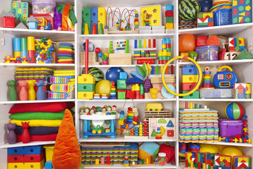 Fototapeta na wymiar Shelf with toys