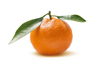 Single mandarin with leaves isolated on white background